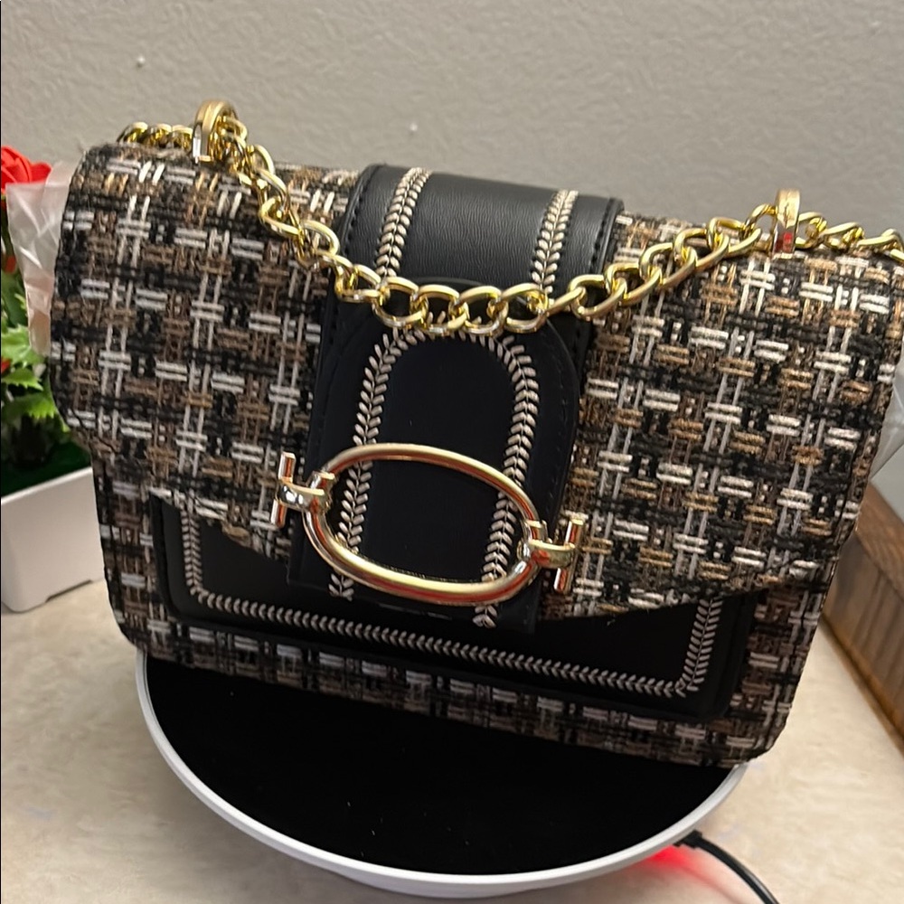 Chic Black and Brown Crossbody Bag with Gold Hardware